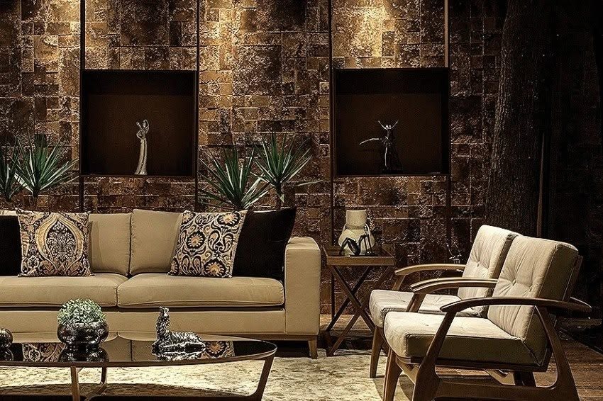 Warm vacation-home lounge with stone wall